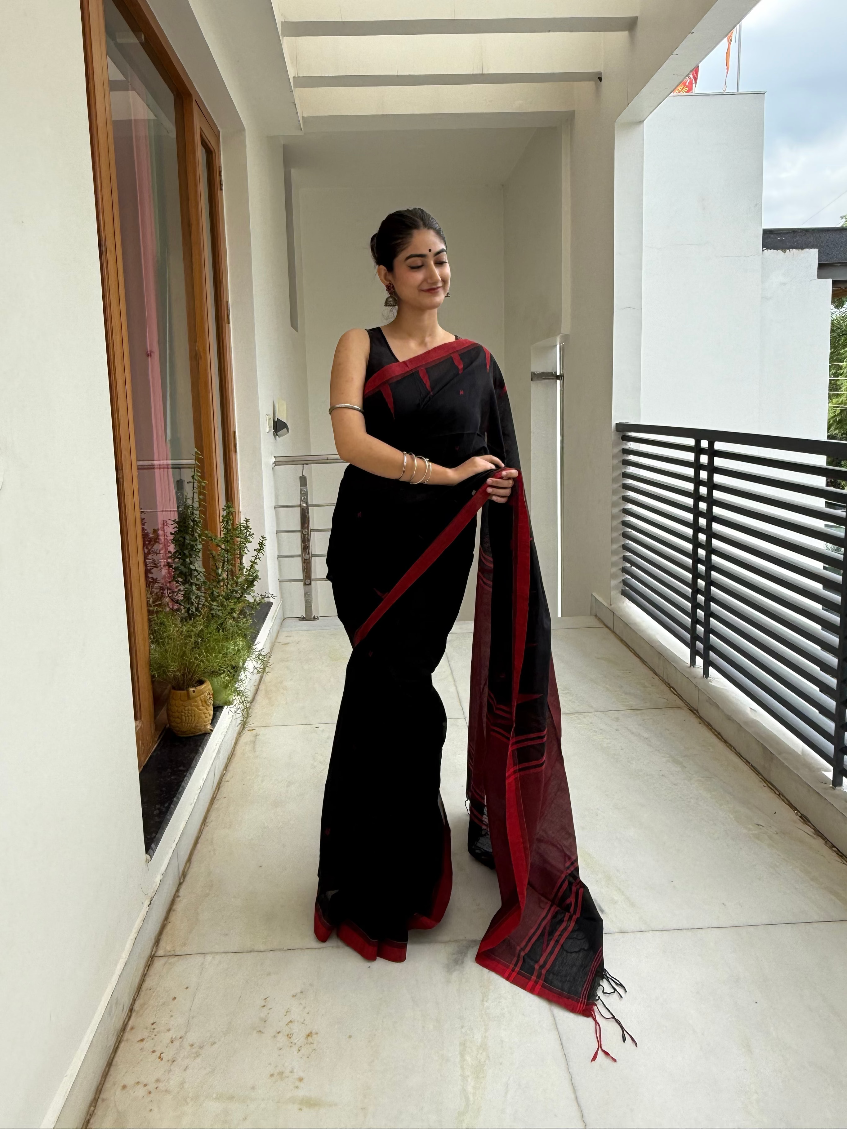 Earthy Mustard Pure Cotton Ajrakh Hand Block Saree draped on model