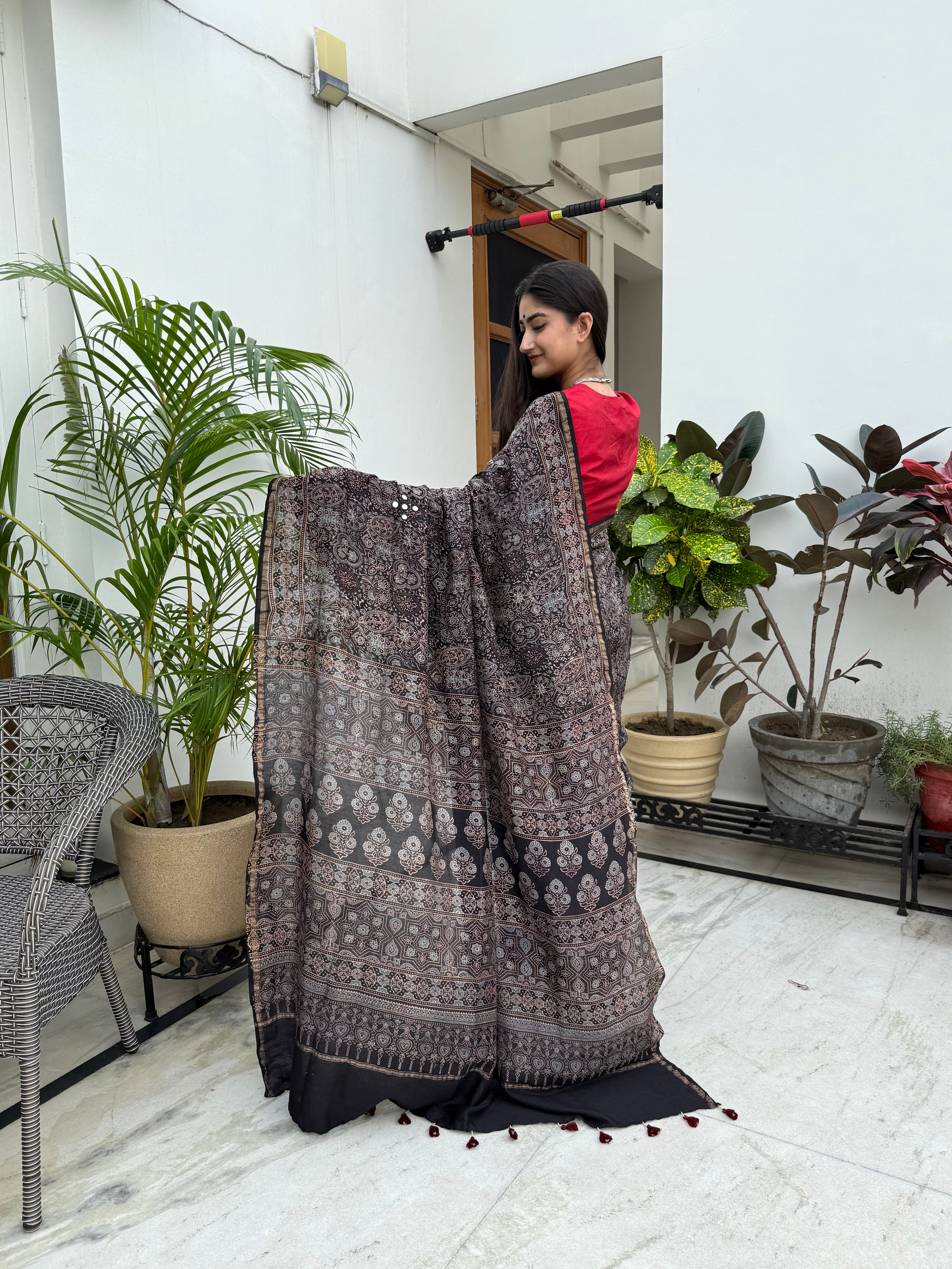 Royal Black Mirror Work Ajrakh Hand Block Pure Chanderi Cotton Silk Saree draped on model