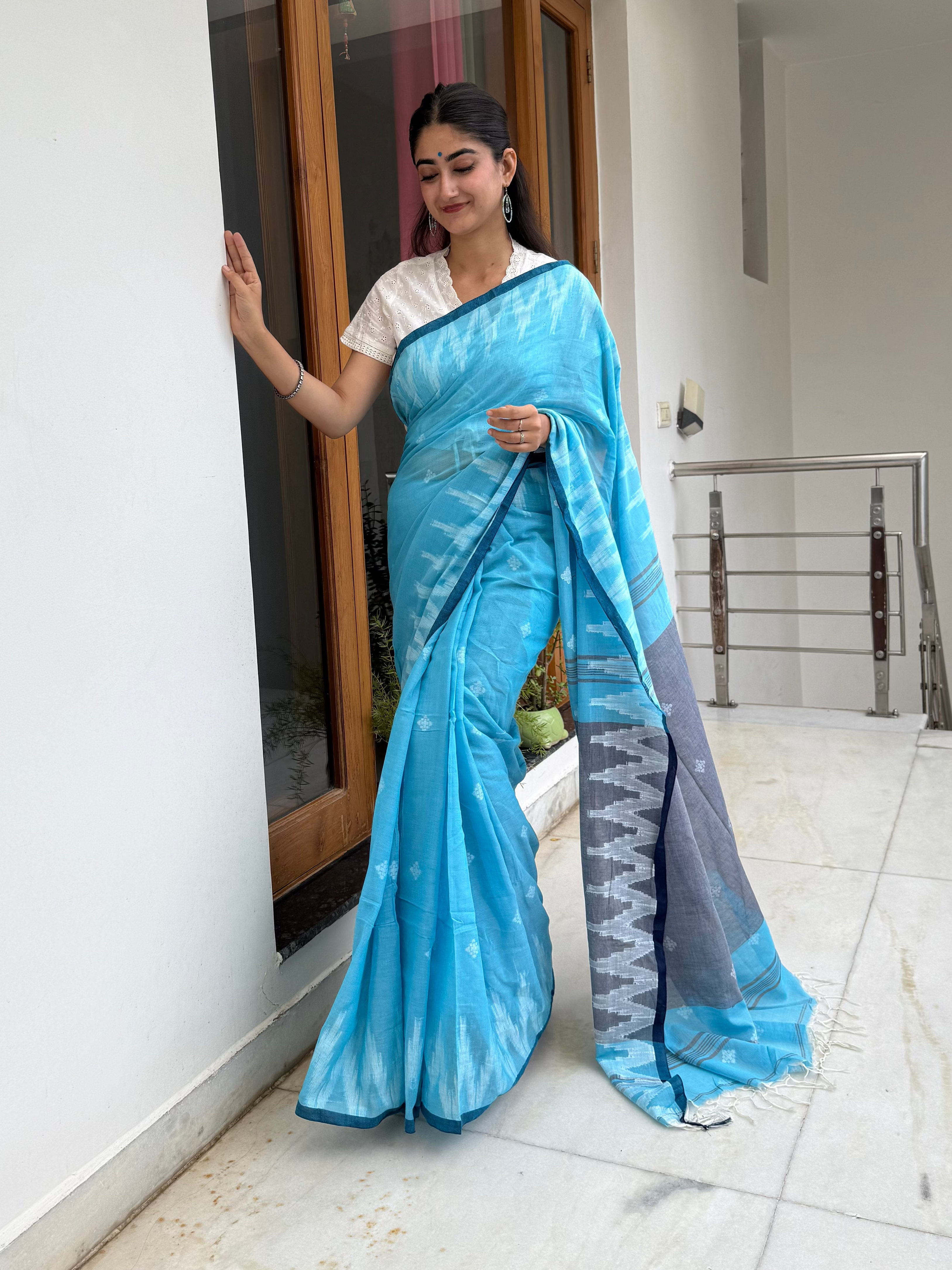 Sky Blue with Border Weaving and Buti Bengal Cotton Saree draped on model