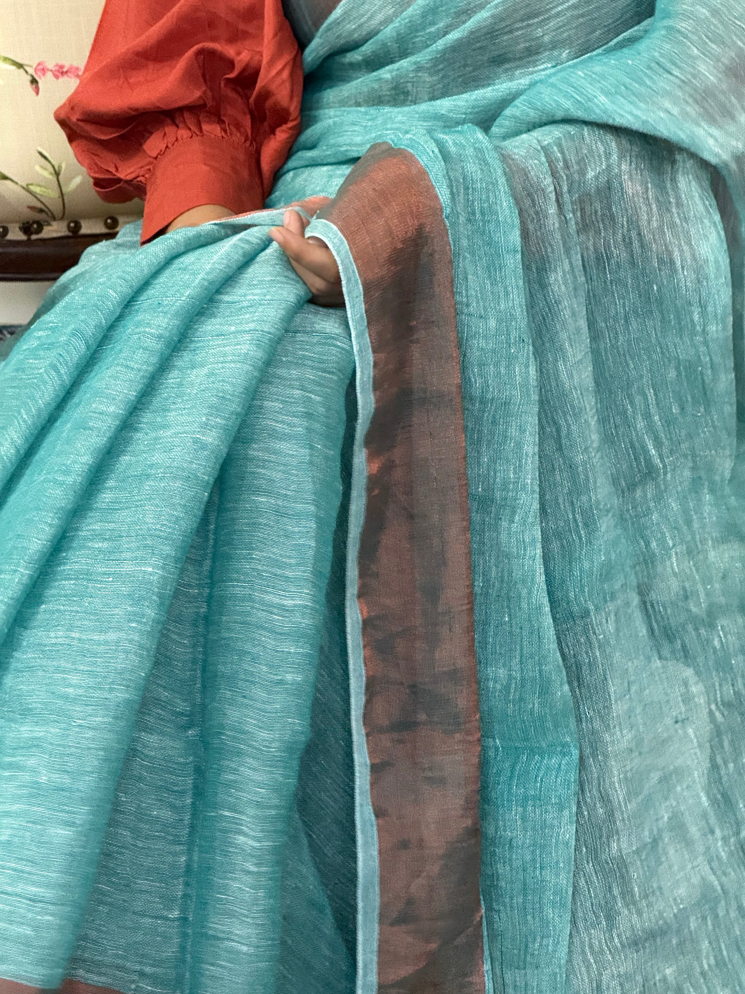 Detailed Zari Border on Sea Green Linen Saree