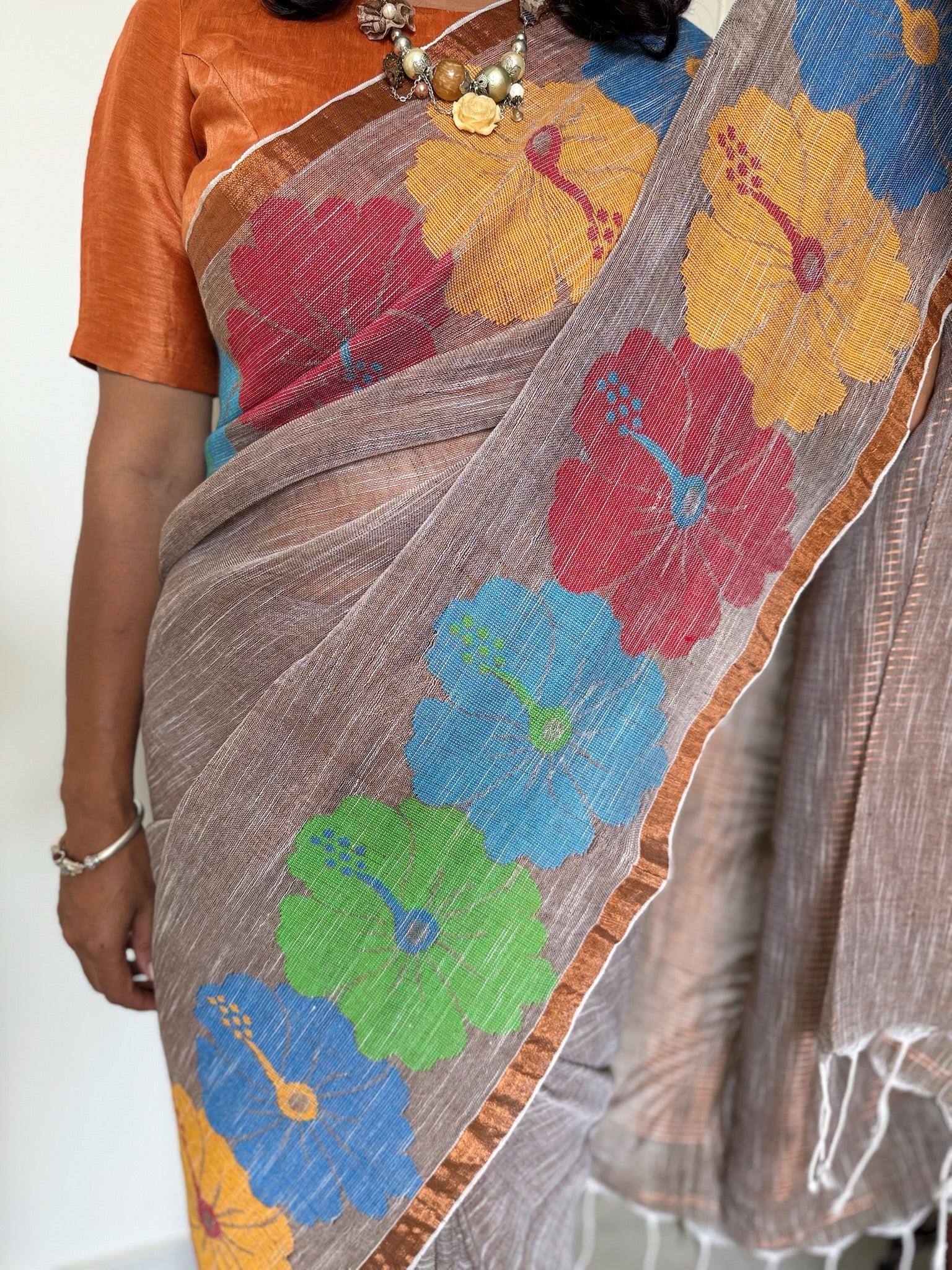 Fawn With Multicolor Flower Weaving Linen Saree
