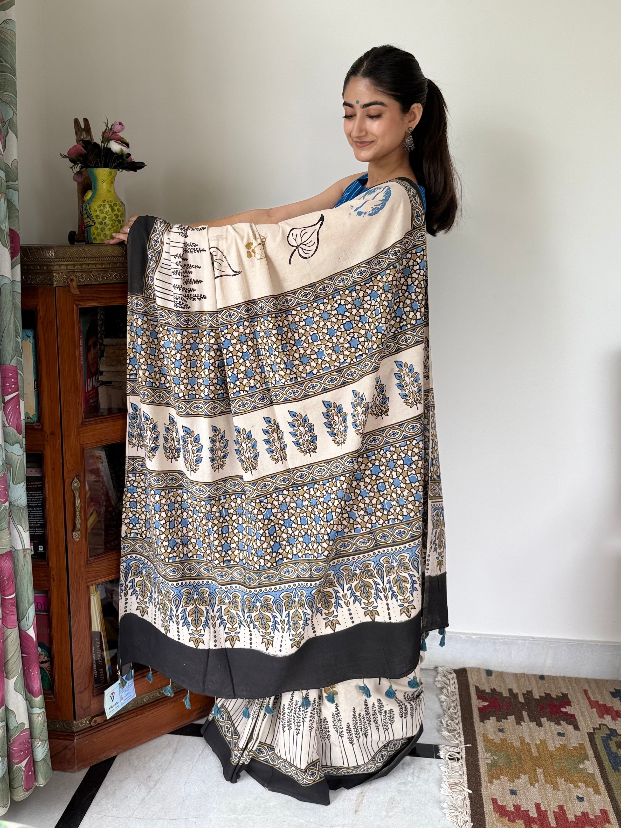  Elegant beige and black Ajrakh saree styled for office or festive wear