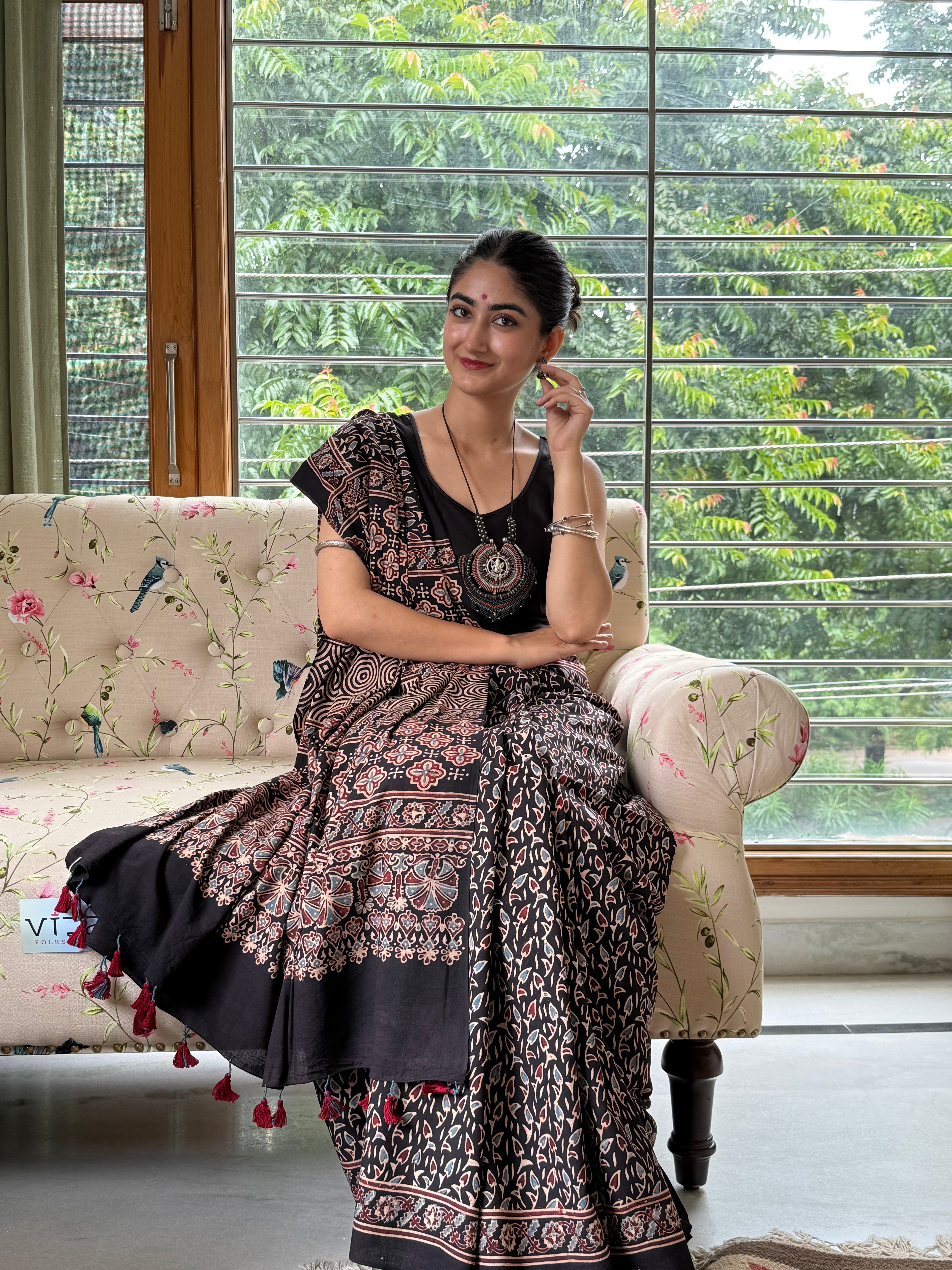  Elegant black Ajrakh saree styled for office and festive wear
 Black Ajrakh printed cotton saree with intricate patterns