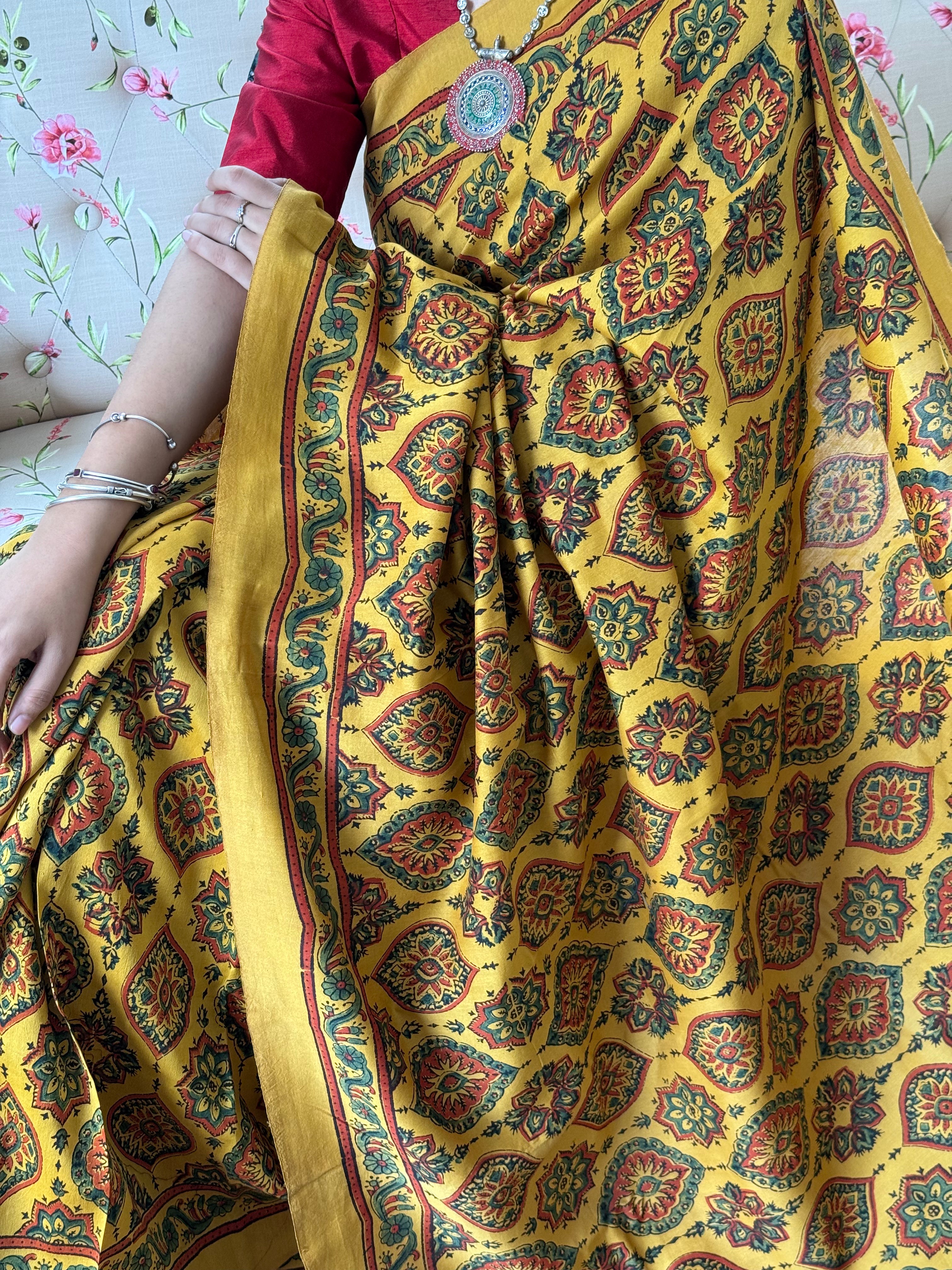  Detailed Ajrakh block print in maroon and green on mustard cotton fabric