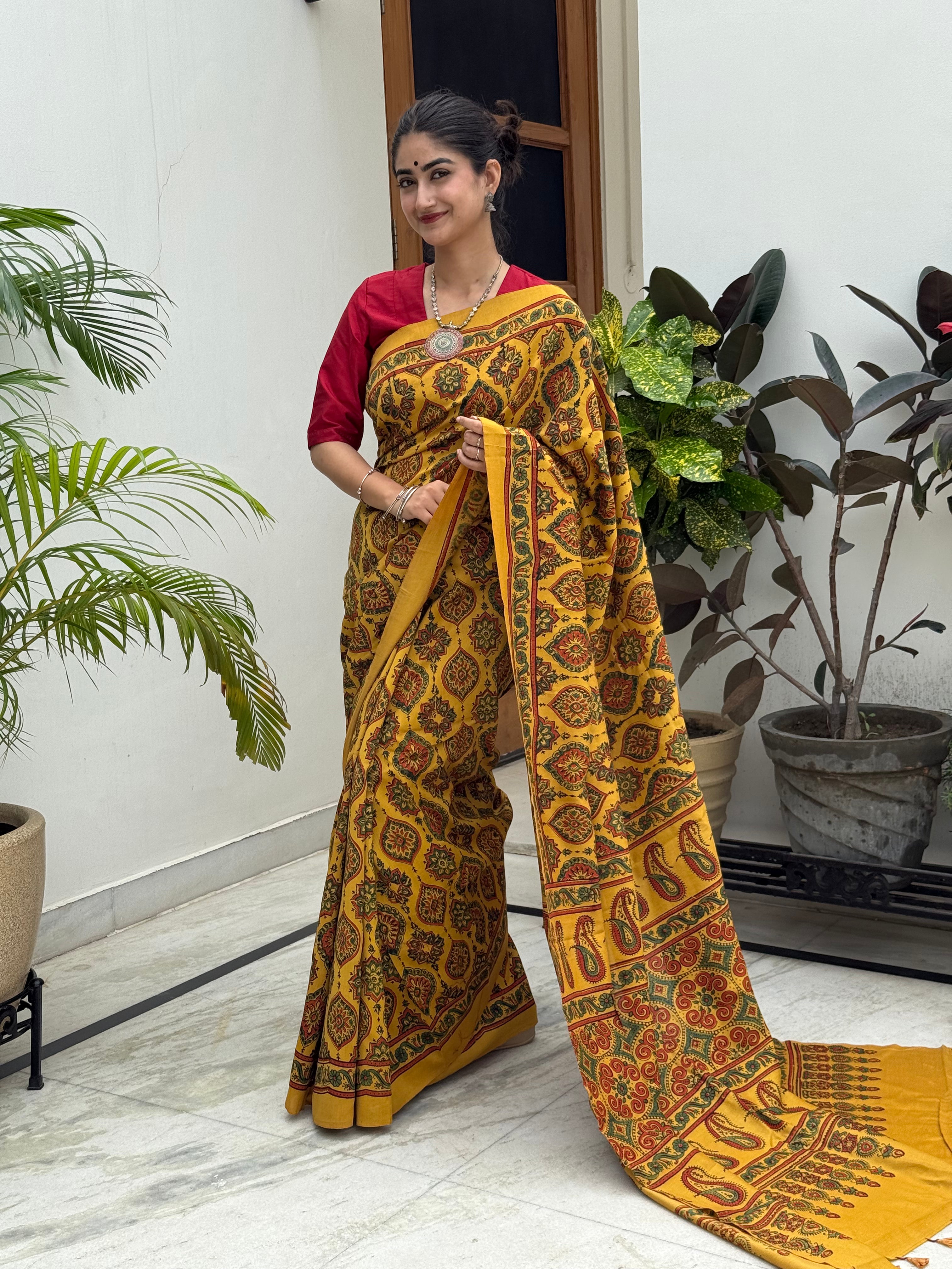 Mustard with Maroon-Green Ajrakh Hand Block Pure Cotton Saree draped on model