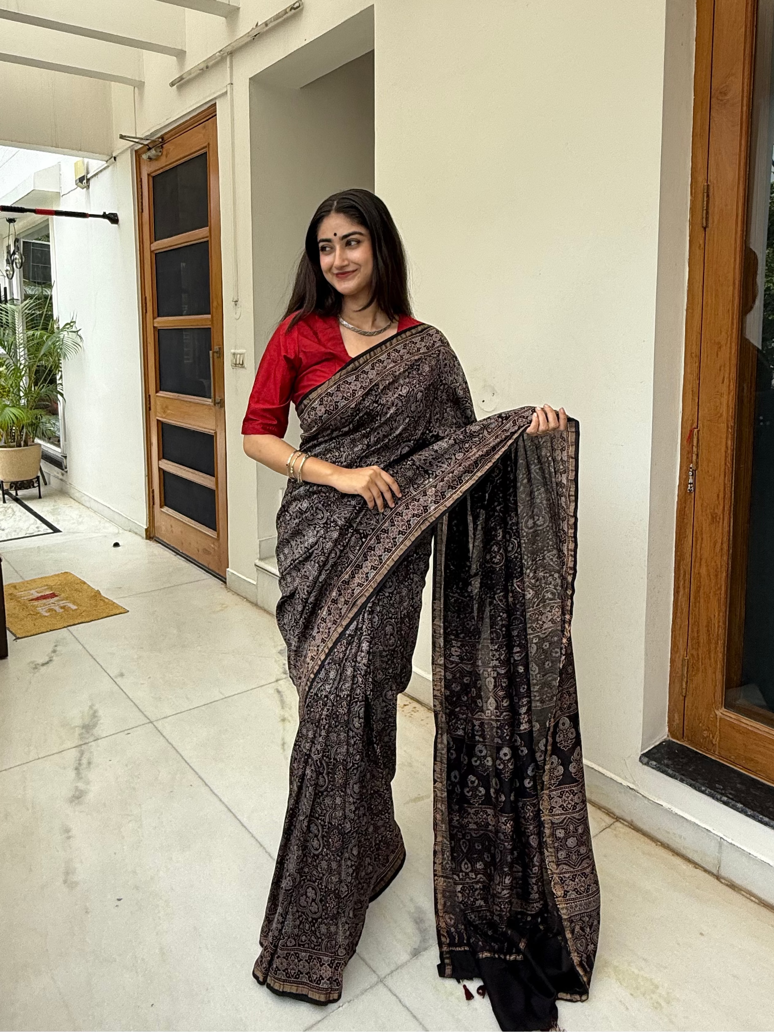 Royal Black Mirror Work Ajrakh Hand Block Pure Chanderi Cotton Silk Saree draped on model