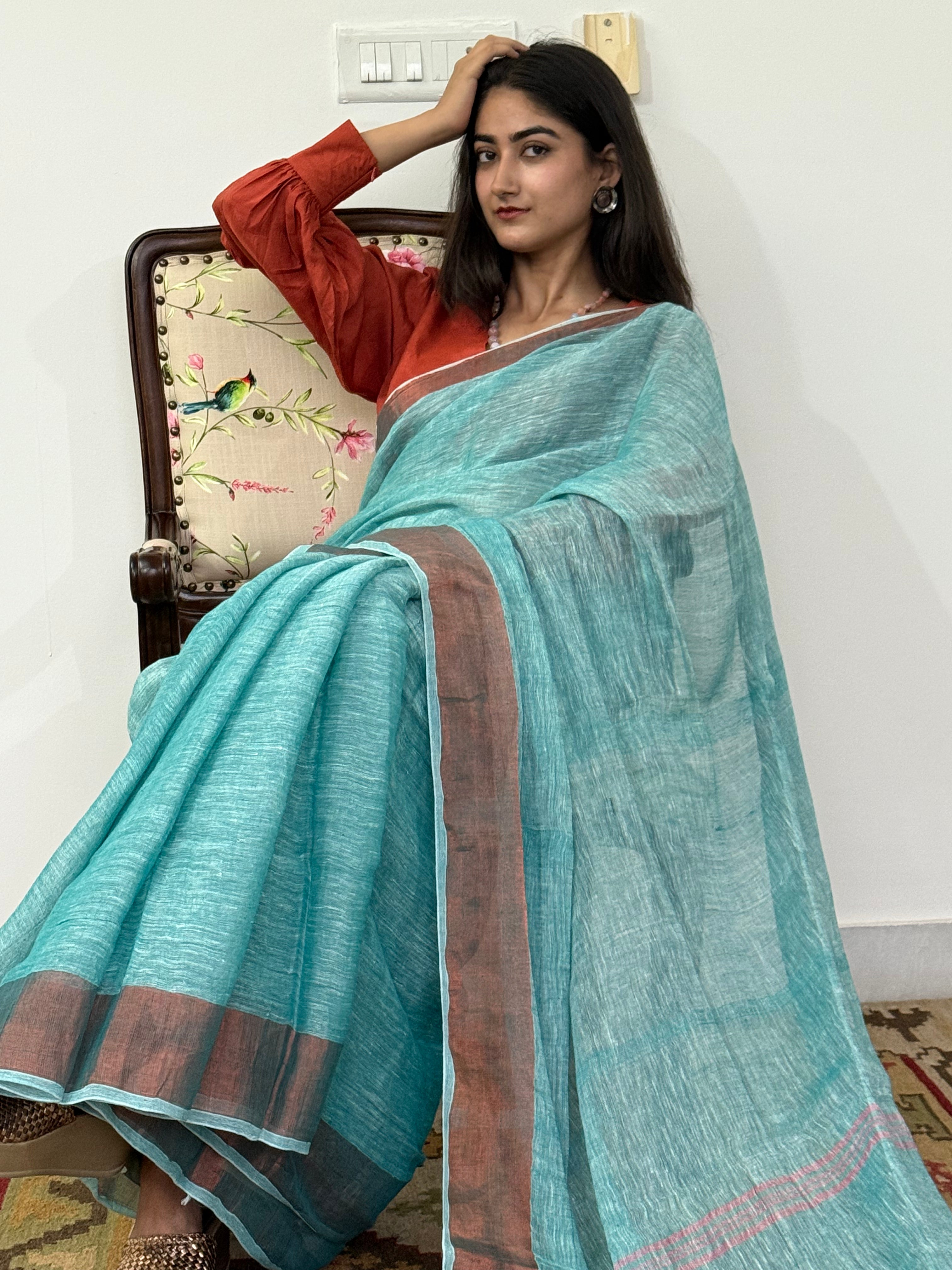 Elegant Sea Green Linen Saree Styled Traditionally
