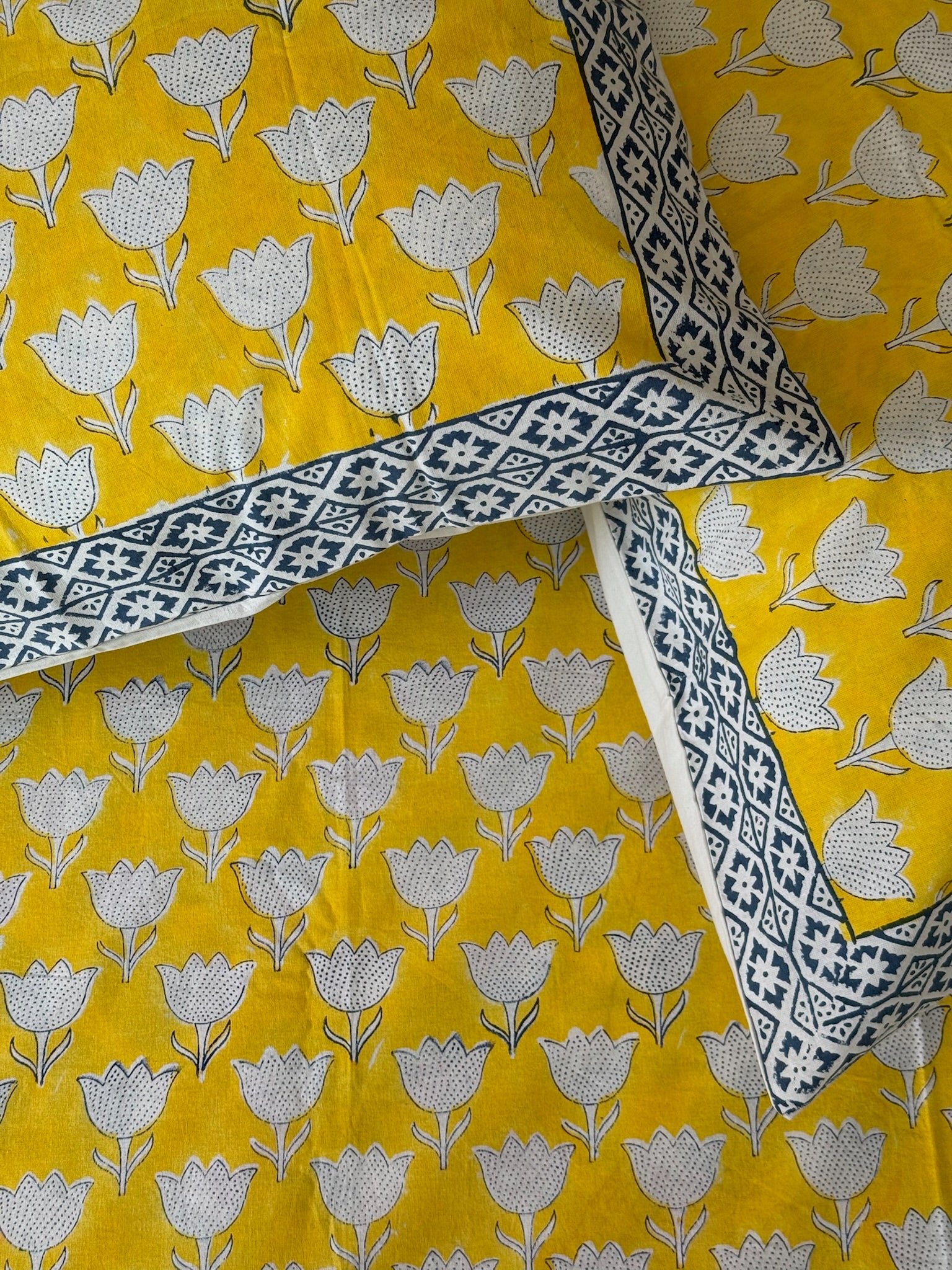 Yellow Floral Cotton Bedsheet with Blue Border