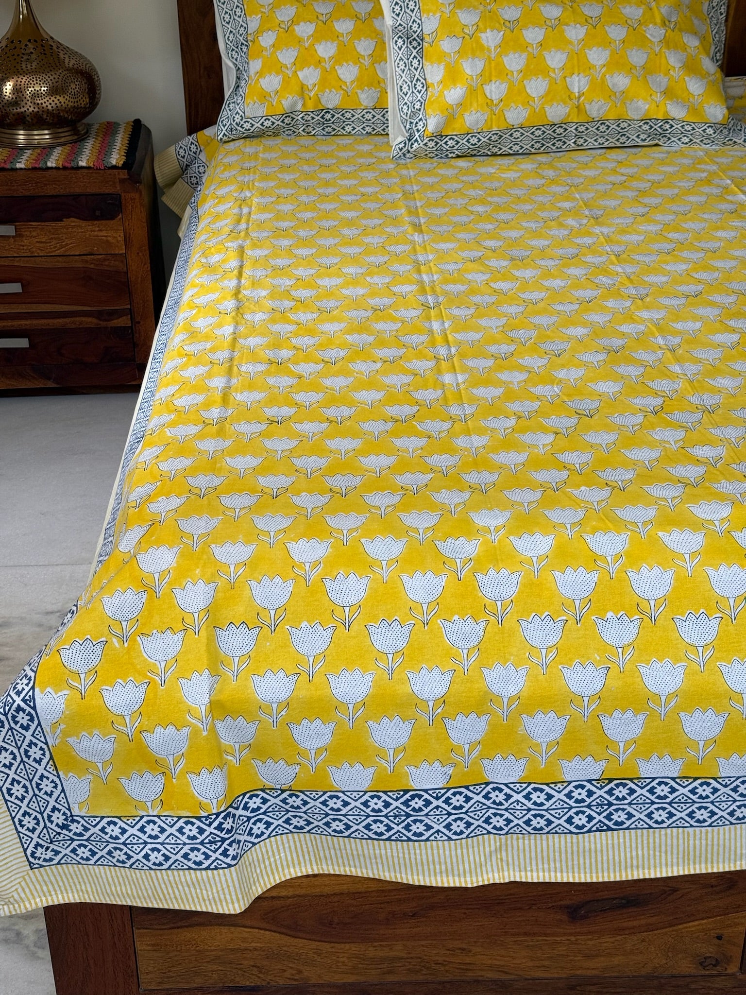 Yellow Floral Cotton Bedsheet with Blue Border