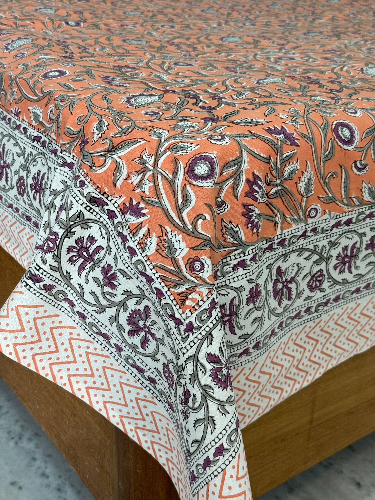 Hand Block Printed Orange Floral Cotton Bedsheet with Purple & White Border