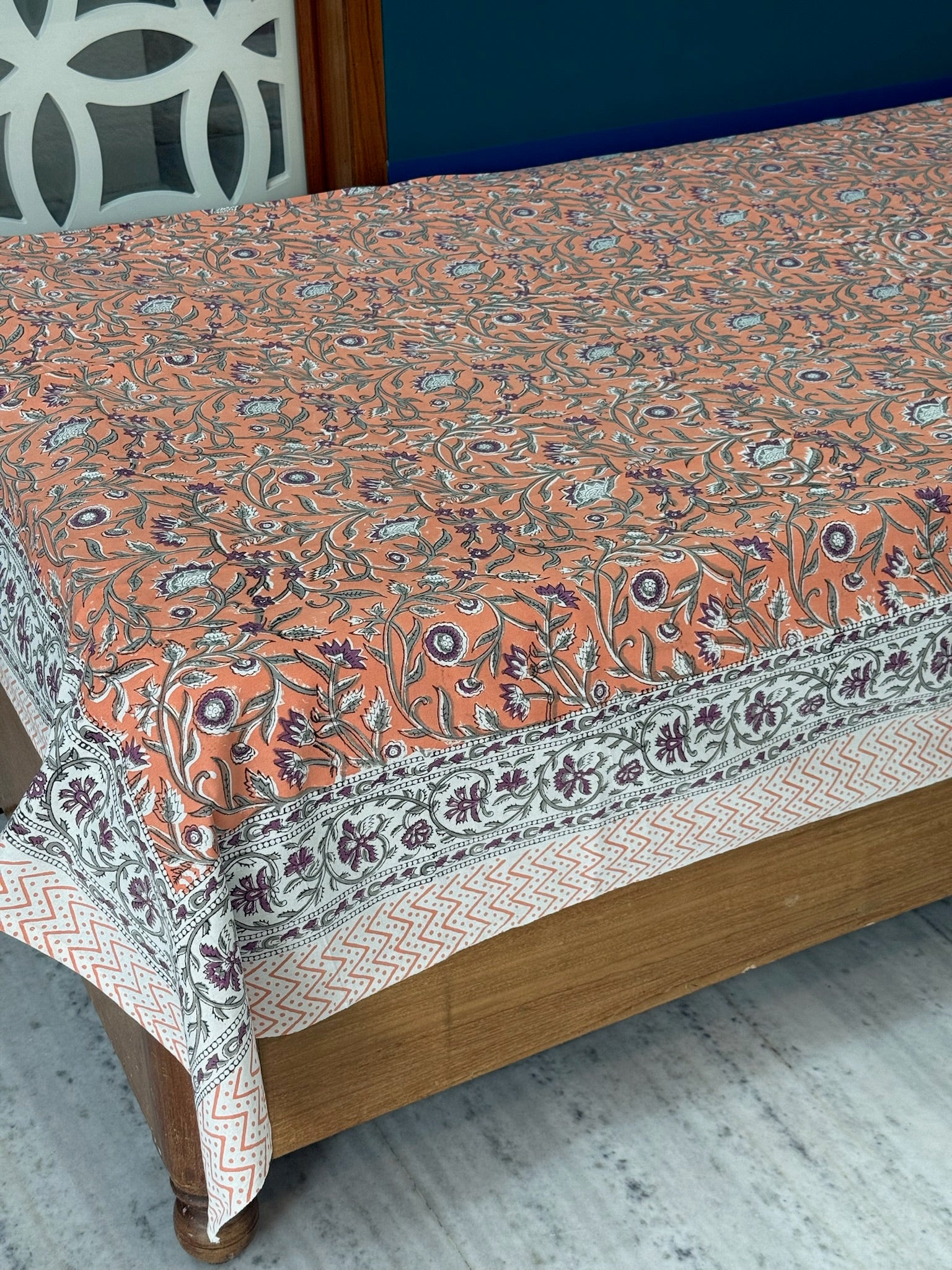 Hand Block Printed Orange Floral Cotton Bedsheet with Purple & White Border