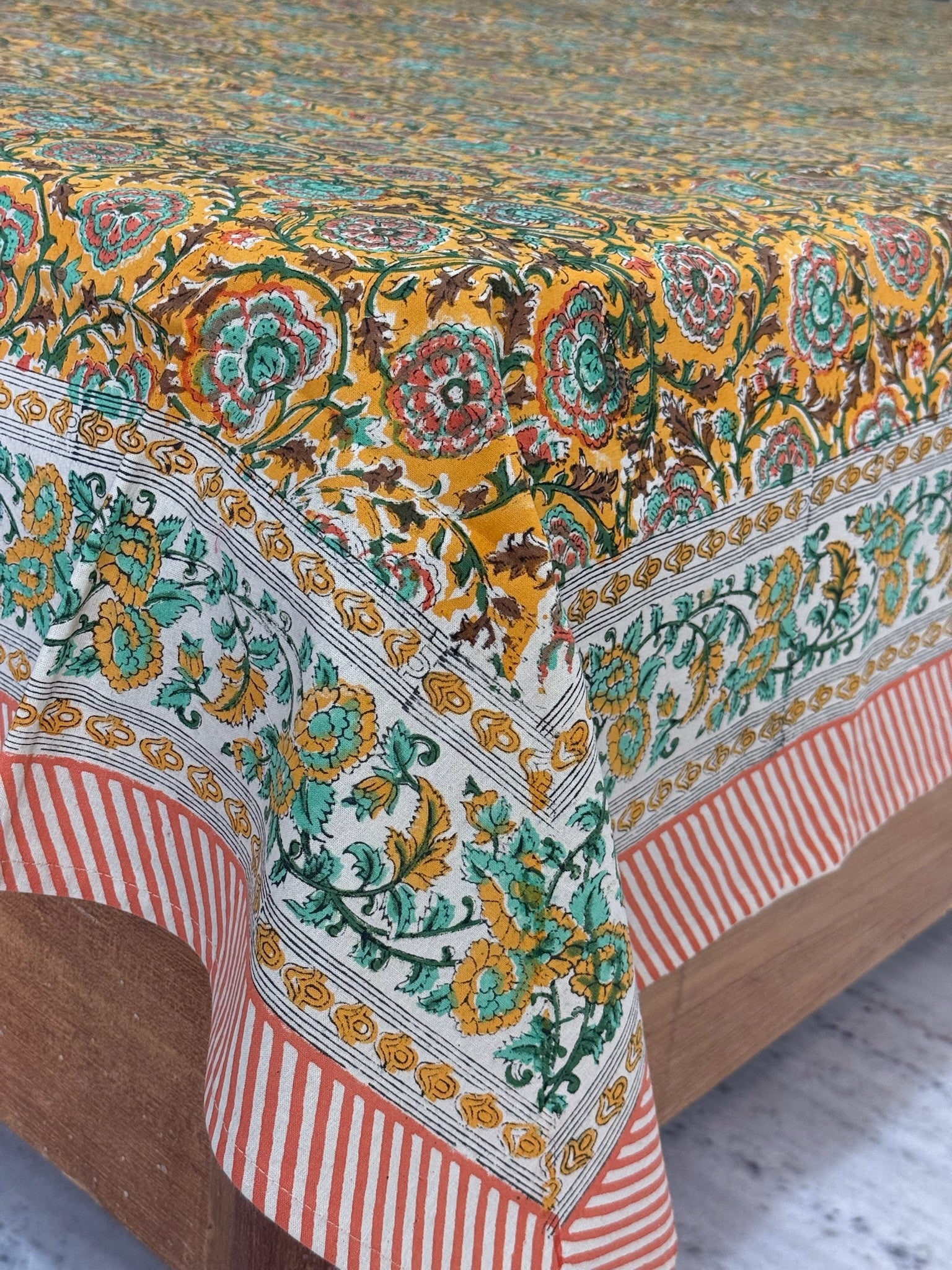 Mustard Floral Cotton Bedsheet with Red Border