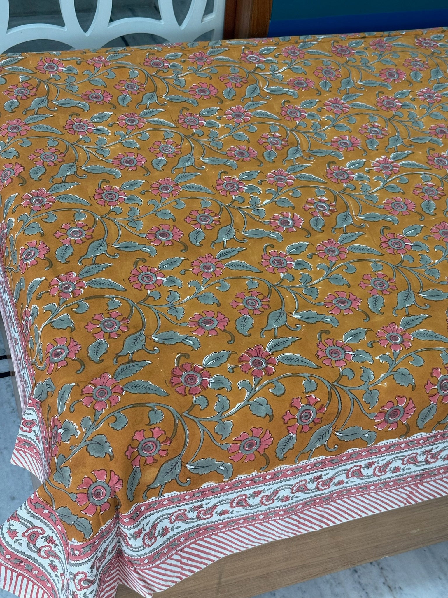 Mustard Floral Cotton Bedsheet with Red Border