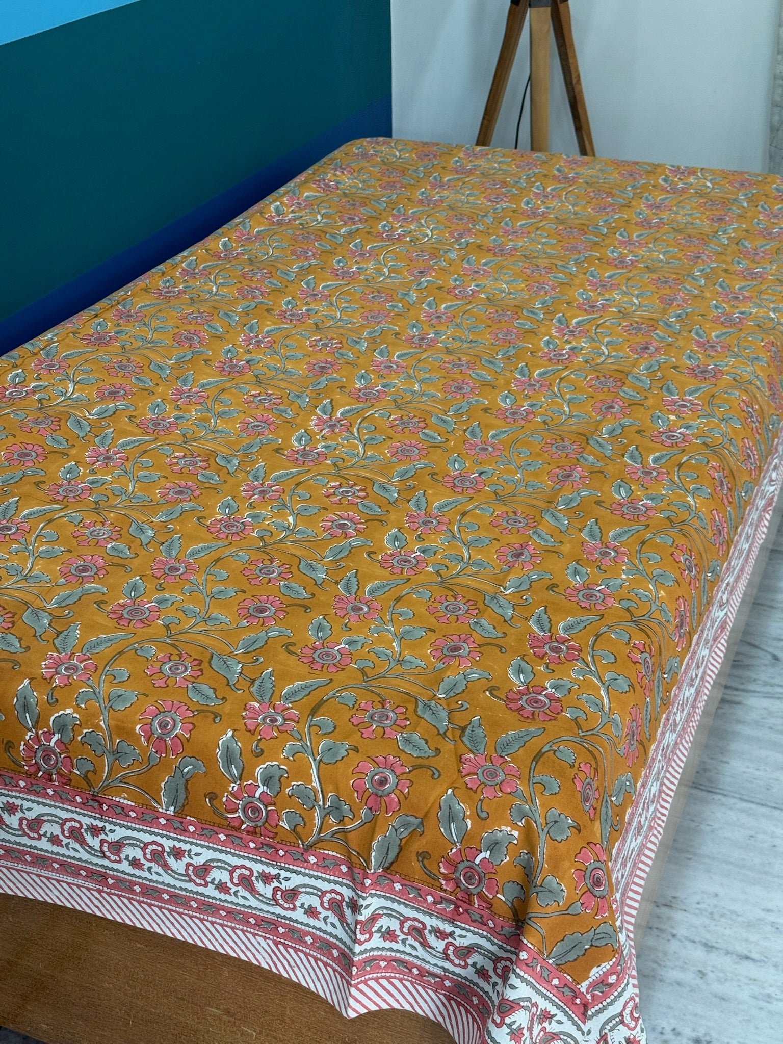 Mustard Floral Cotton Bedsheet with Red Border